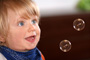 Kid with soap bubbles